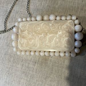 White pearl clutch